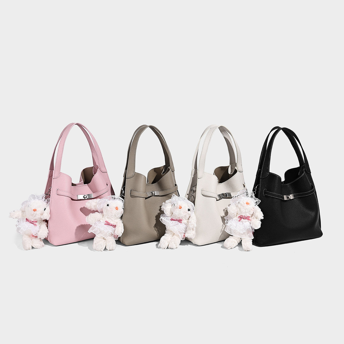 Large-capacity pebbled leather-look tote bag with silver-tone turn-lock strap detail and double top handles, detail view 2