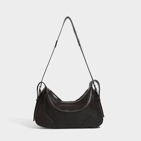 Dark brown curved zip-top hobo shoulder bag with slim adjustable strap and silver-tone hardware, detail view 7