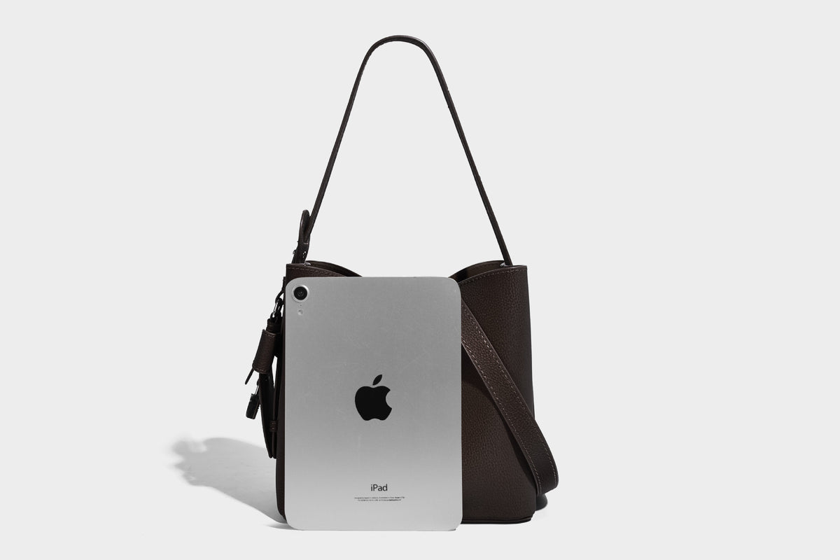 Pebbled leather-look bucket shoulder bag with zip inner pouch and adjustable crossbody strap, detail view 12
