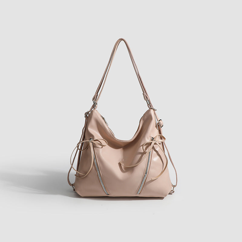 Slouchy hobo shoulder bag with bow detail and silver-tone hardware, front view