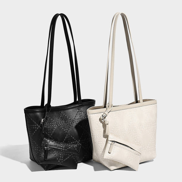 Quilted diamond-pattern tote bag with attached front zip pouch and long shoulder straps, detail view 2