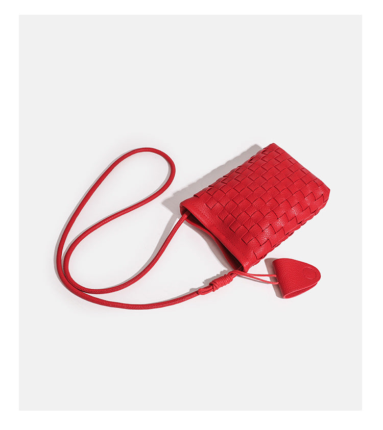 Mini woven square-pattern crossbody phone bag with long cord strap and front snap flap pocket in red textured leather-look