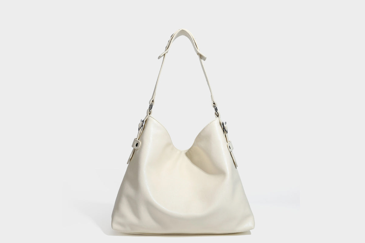 Large slouchy hobo shoulder bag in dark brown with smooth leather-look finish, adjustable strap, and silver-tone hardware