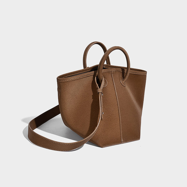 Small structured matte pebbled tote bag with twin top handles and removable zip pouch, detail view 9