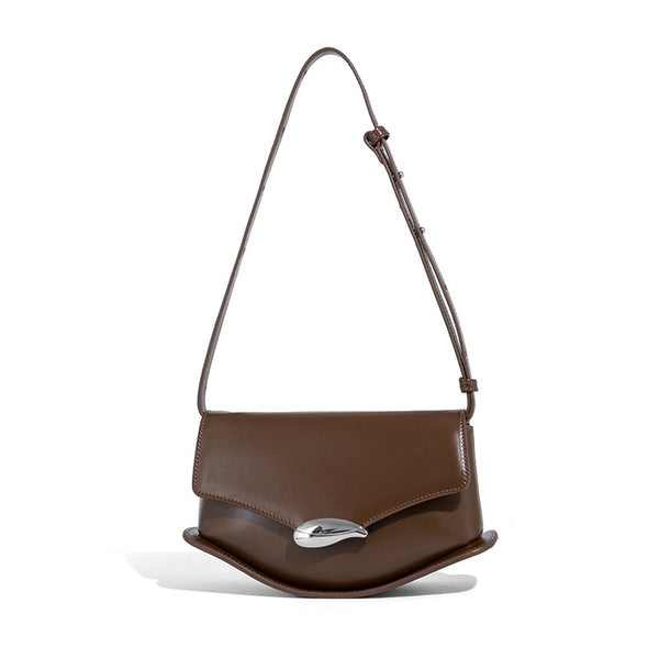 Small structured saddle bag with glossy leather-look finish, angular flap front, silver-tone metal clasp, and slim
