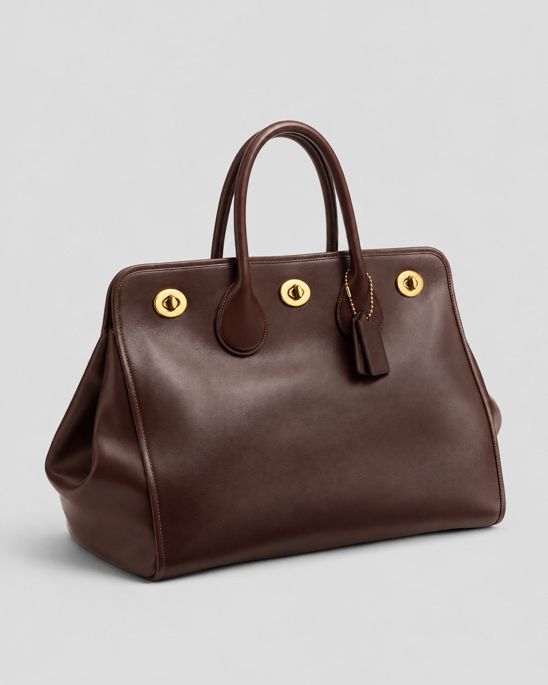 Structured leather-look tote bag with three gold-tone turn-lock closures and double rolled top handles, detail view 18