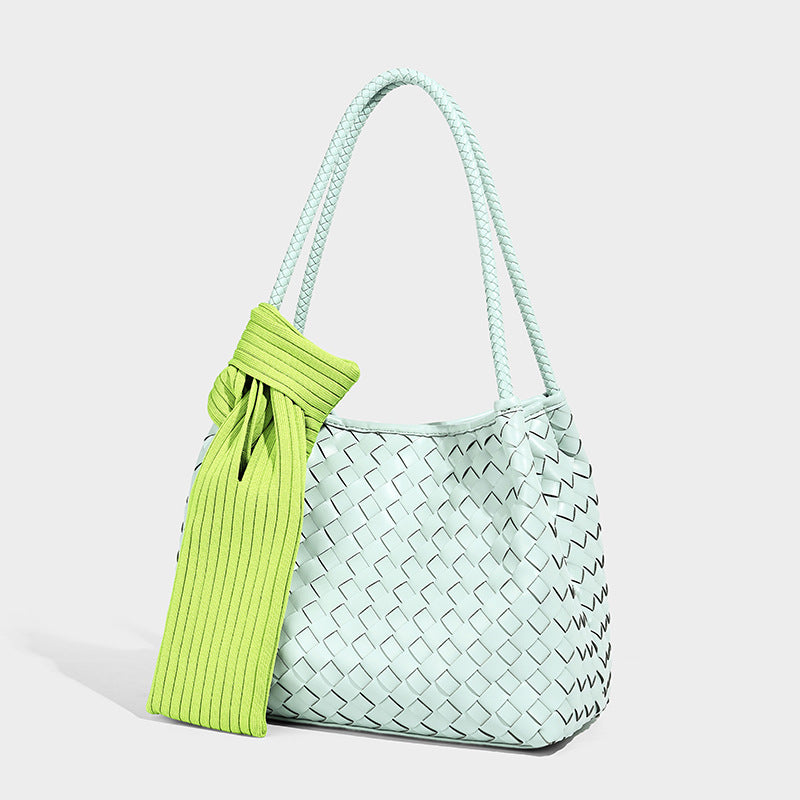 Glossy woven shoulder tote bag with braided double straps in mint green, front view