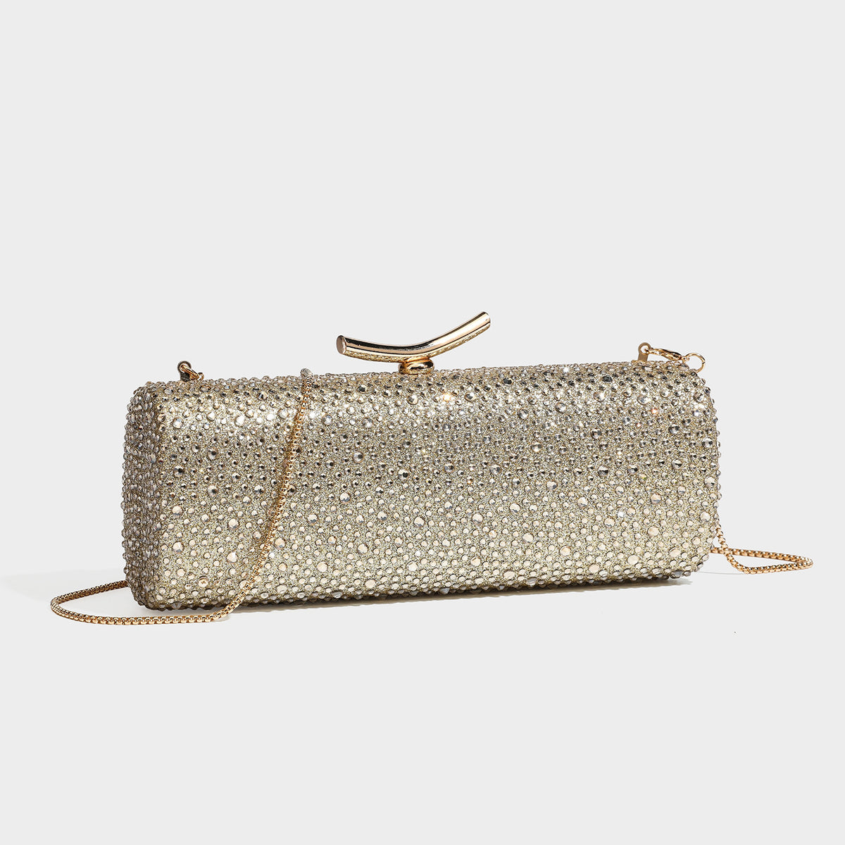 Structured rectangular hard-case clutch bag covered in all-over rhinestone crystal embellishment with curved kiss-lock top