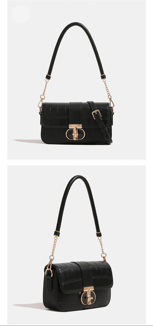 Small structured crocodile-embossed flap shoulder bag with circular gold turn-lock closure and chain-accent strap, detail