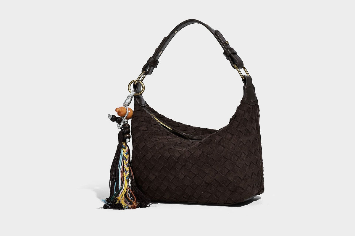 Small woven-texture crescent hobo bag in dark chocolate brown with top zip closure, gold-tone hardware, and adjustable