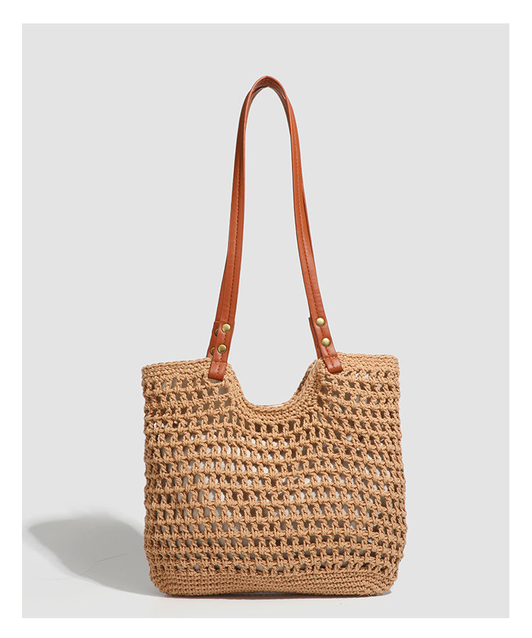 Open-knit woven tote bag with leather-look shoulder straps and brass-tone hardware in off-white, detail view 12