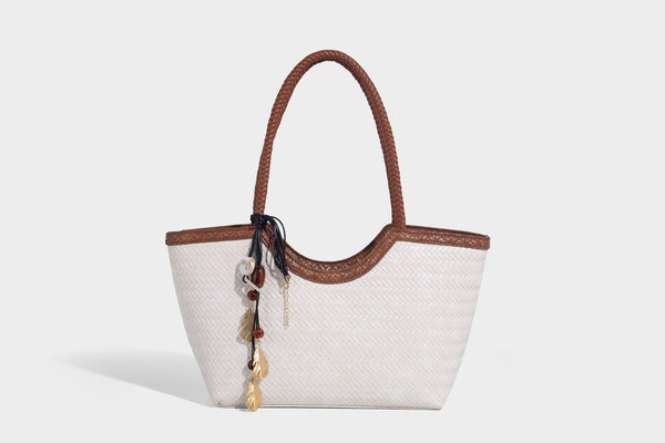 Large open-top woven tote bag with contrasting braided double handles and matching drawstring pouch, detail view 21