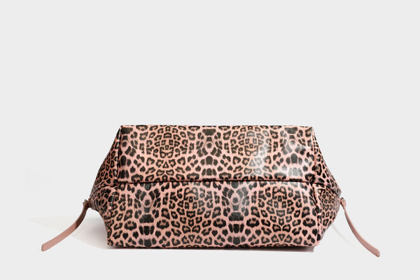 Large leopard print shoulder tote bag with glossy finish, long double straps, front zip pocket, silver-tone hardware, and