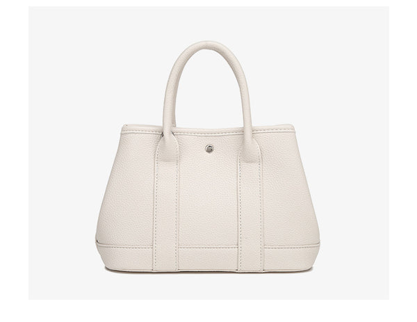 Structured pebbled leather-look top-handle tote bag with elephant charm and detachable shoulder strap, detail view 18