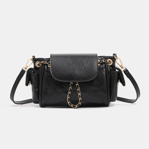 Small quilted leather-look flap bag with gold-tone chain strap and diamond stitch pattern, detail view 6