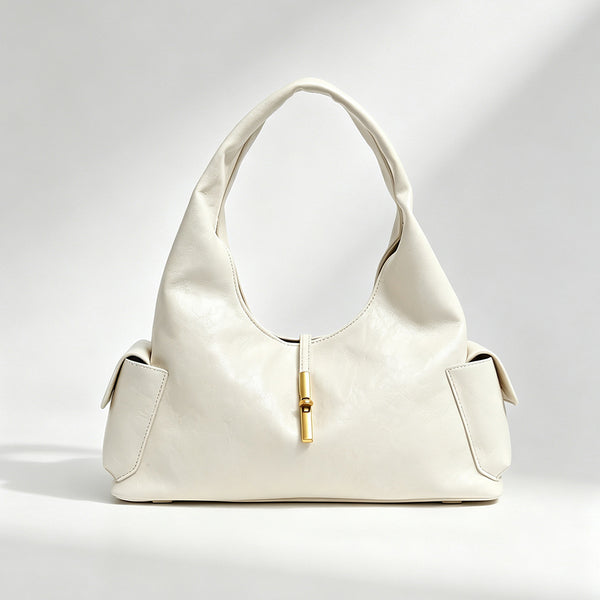 Slouchy leather-look hobo shoulder bag with gold-tone bar clasp and crinkled glossy finish, detail view 6