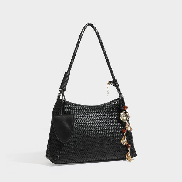 Woven-texture hobo shoulder bag in brown with braided top handle, adjustable crossbody strap, front flap pocket, and, detail