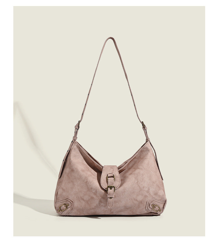 Slouchy distressed leather-look hobo bag with antique brass buckle closure and adjustable shoulder strap, detail view 10