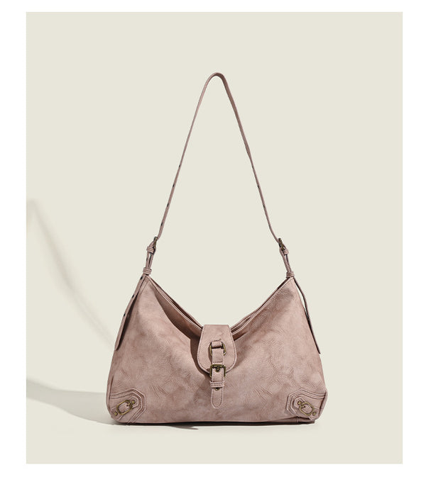 Slouchy distressed leather-look hobo bag with antique brass buckle closure and adjustable shoulder strap, detail view 10