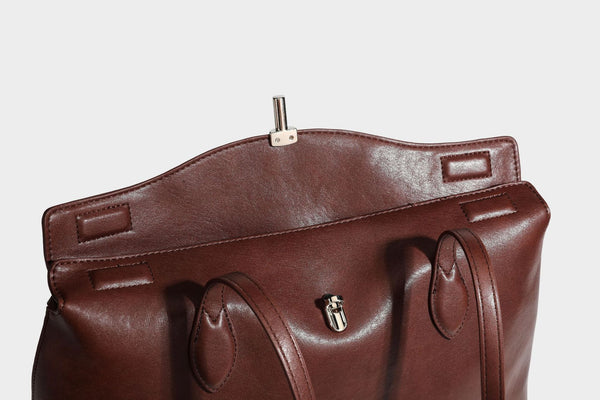 Large leather-look tote shoulder bag with slim double straps and silver-tone turn-lock closure, detail view 39