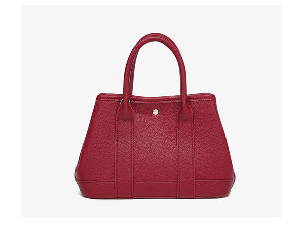 Structured pebbled leather-look top-handle tote bag with elephant charm and detachable shoulder strap, detail view 20