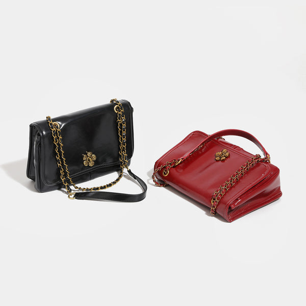 Structured glossy flap shoulder bag with antique gold floral turn-lock clasp and chain-and-leather strap, detail view 3