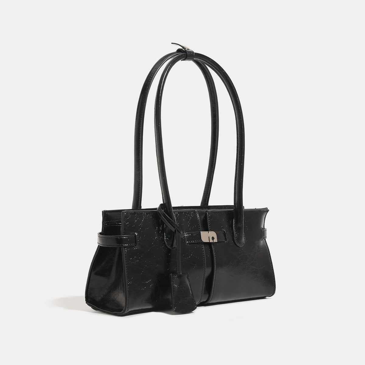 Structured glossy leather-look tote bag with long loop handles and silver turn-lock buckle closure, detail view 3