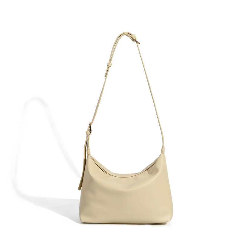Soft slouchy zip shoulder crossbody bag with smooth matte leather-look finish and gold-tone hardware, detail view 5