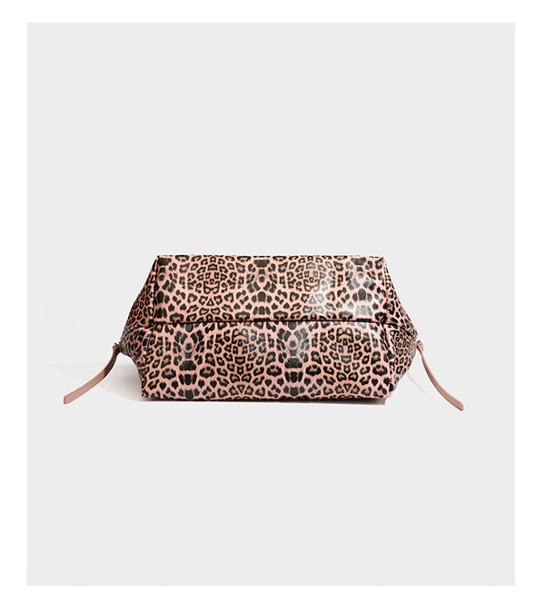 Large leopard print shoulder tote bag with glossy finish, long double straps, front zip pocket, silver-tone hardware, and