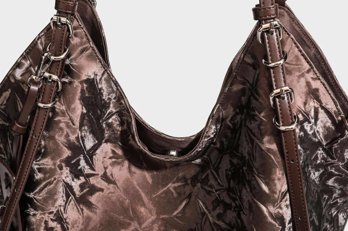 Slouchy crinkle-finish shoulder tote bag with silver hardware and attached zip pouch, detail view 32