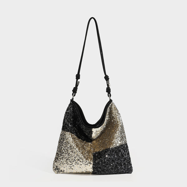 Lässig fallende Schulter-Tote mit Patchwork-Pailletten, Colorblocking-Einsätzen in Schwarz-Gold oder Creme-Silber und verstellbarem schmalem Riemen