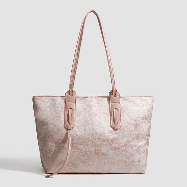 Large structured floral jacquard tote bag with long leather-look shoulder strap, front view