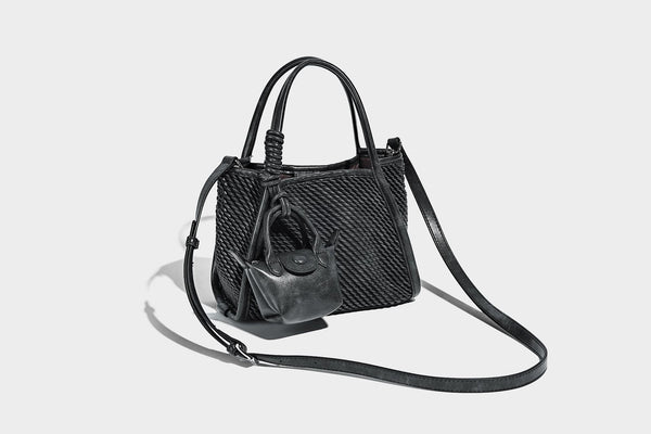 Large structured woven rope-texture tote bag with smooth leather-look trim, knotted dual top handles, detachable mini front