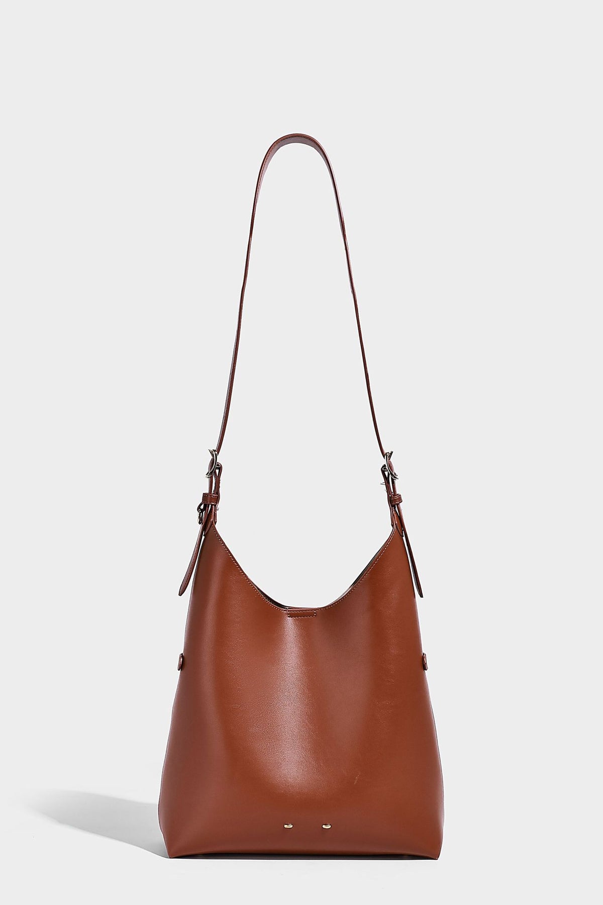 Large open-top hobo shoulder bag in tan leather-look finish with detachable zip pouch and adjustable buckle strap, detail