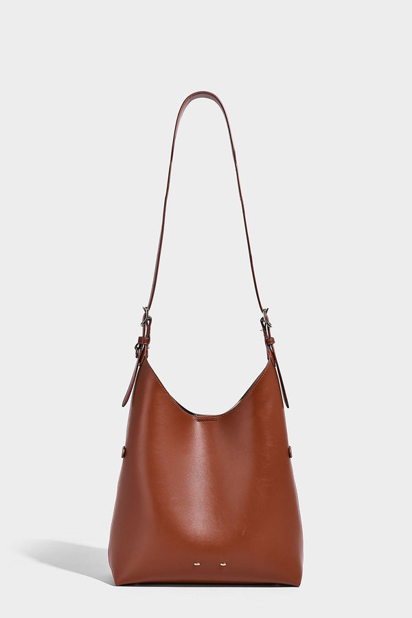 Large open-top hobo shoulder bag in tan leather-look finish with detachable zip pouch and adjustable buckle strap, detail