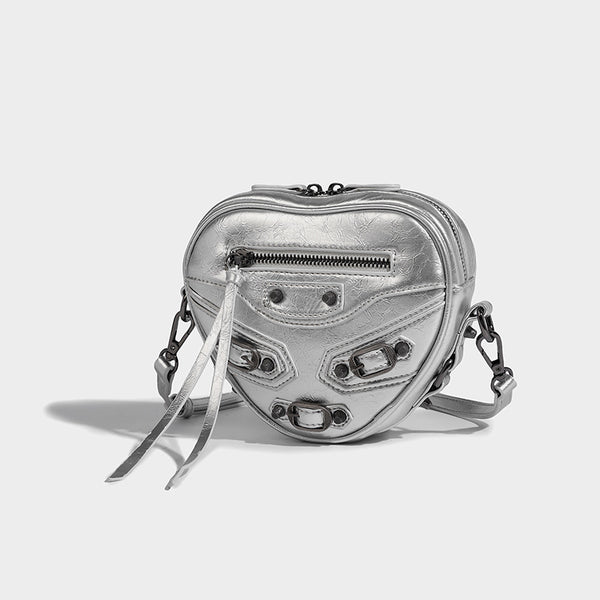 Mini heart-shaped crossbody bag with glossy crinkled finish and moto buckle hardware, detail view 28