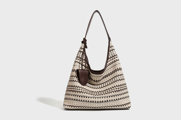 Slouchy woven stripe hobo shoulder bag with black-and-white pattern and leather-look strap, detail view 18