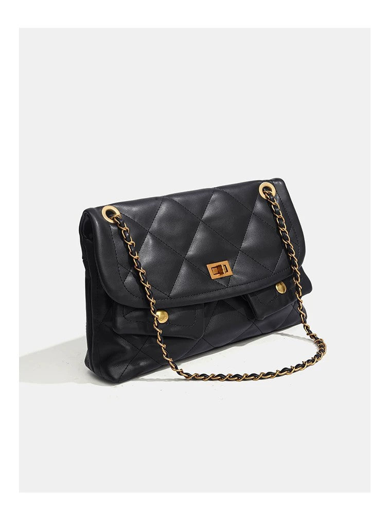 Quilted diamond flap shoulder bag with gold-tone chain strap and twist-lock closure, detail view 13