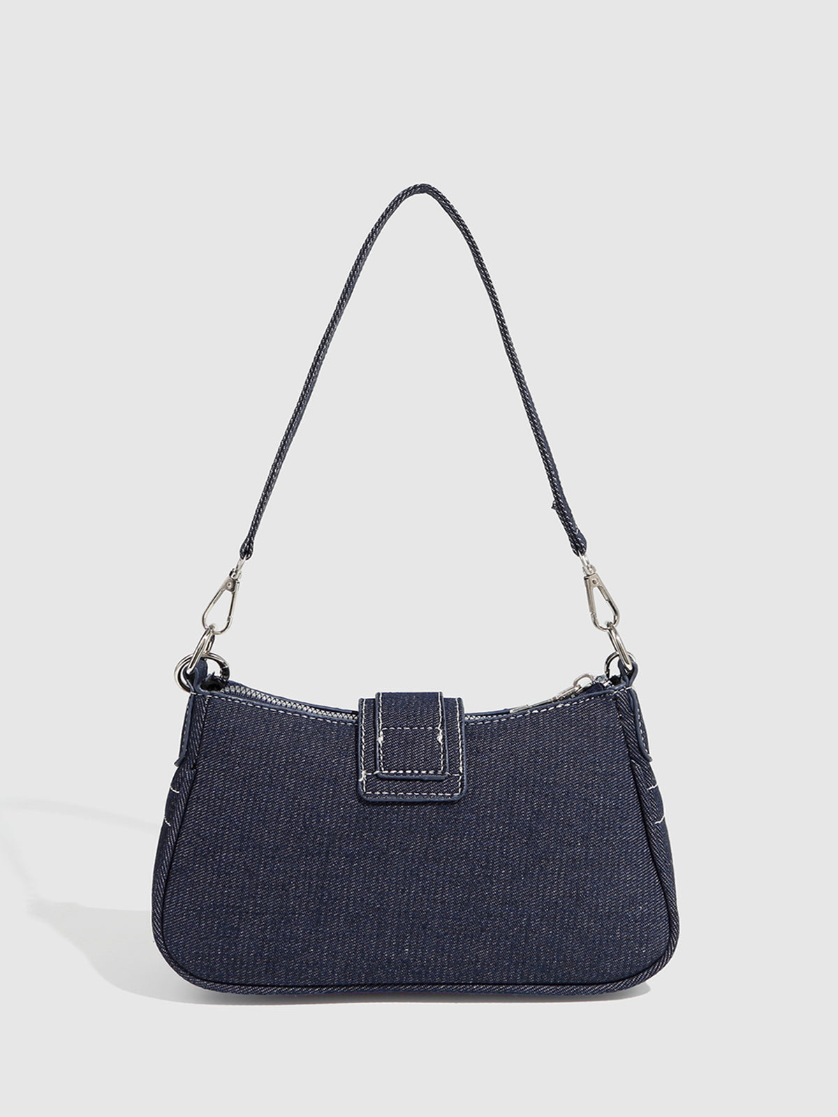 Dark navy denim-look shoulder bag with light blue and pink star appliqués, silver-tone buckle, chain strap, and short top