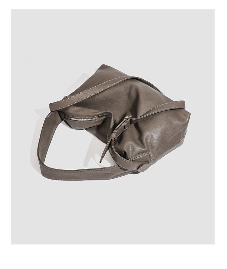 Slouchy leather-look hobo shoulder bag with top zipper and silver-tone hardware, detail view 24