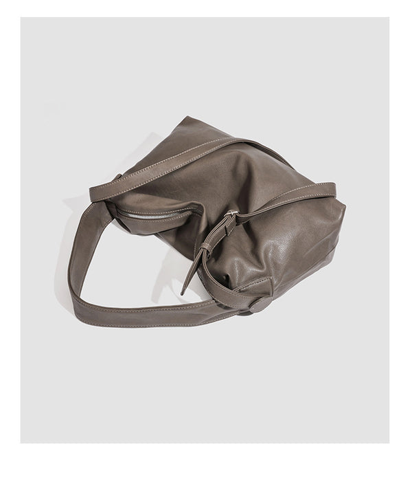 Slouchy leather-look hobo shoulder bag with top zipper and silver-tone hardware, detail view 24