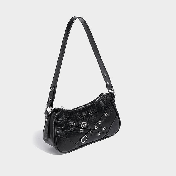 Compact moto-inspired shoulder bag with crisscross grommet strap detail, glossy textured finish, and adjustable crossbody