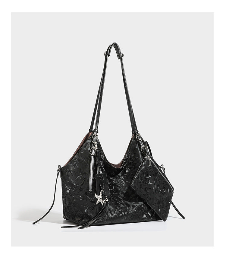 Slouchy crinkle-finish shoulder tote bag with silver hardware and attached zip pouch, detail view 15