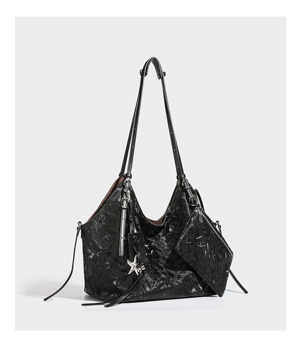 Slouchy crinkle-finish shoulder tote bag with silver hardware and attached zip pouch, detail view 15