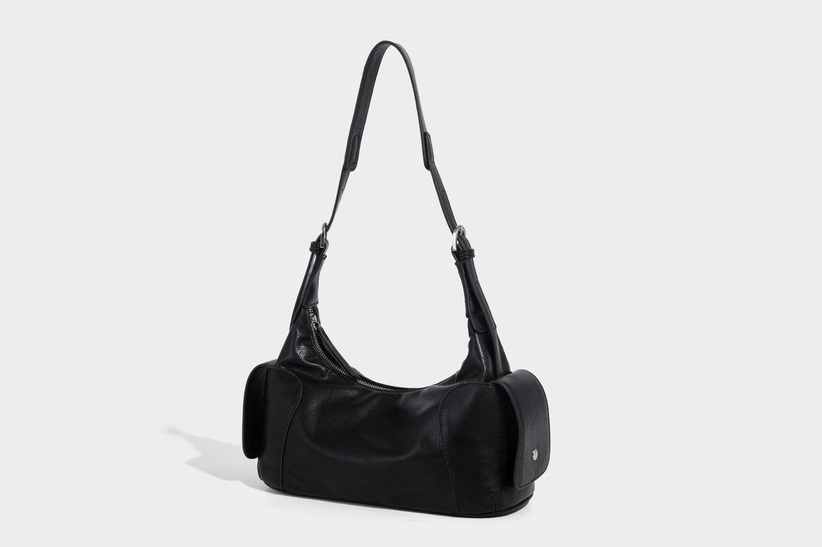 Soft pebbled leather-look hobo shoulder bag with zip top closure, side flap pockets, and silver-tone hardware, detail view 15