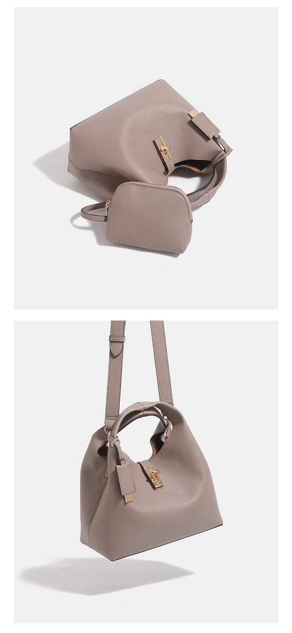 Structured pebbled leather-look bucket bag with gold-tone turn-lock clasp and looped top handle, detail view 13