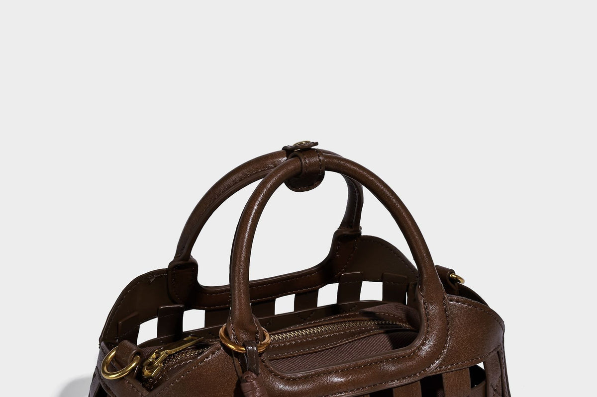 Small structured woven lattice top-handle satchel bag with bead-and-tassel charm and gold-tone hardware, detail view 21