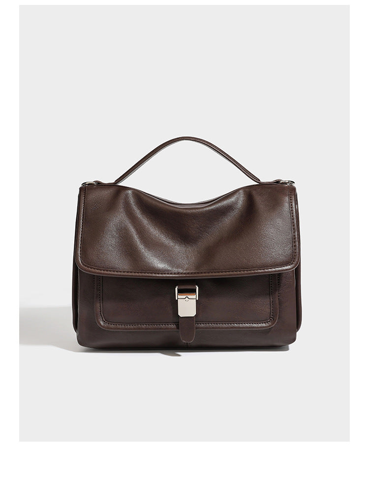 Structured rectangular satchel bag in dark espresso brown with smooth leather-look finish, flap front with silver turn-lock