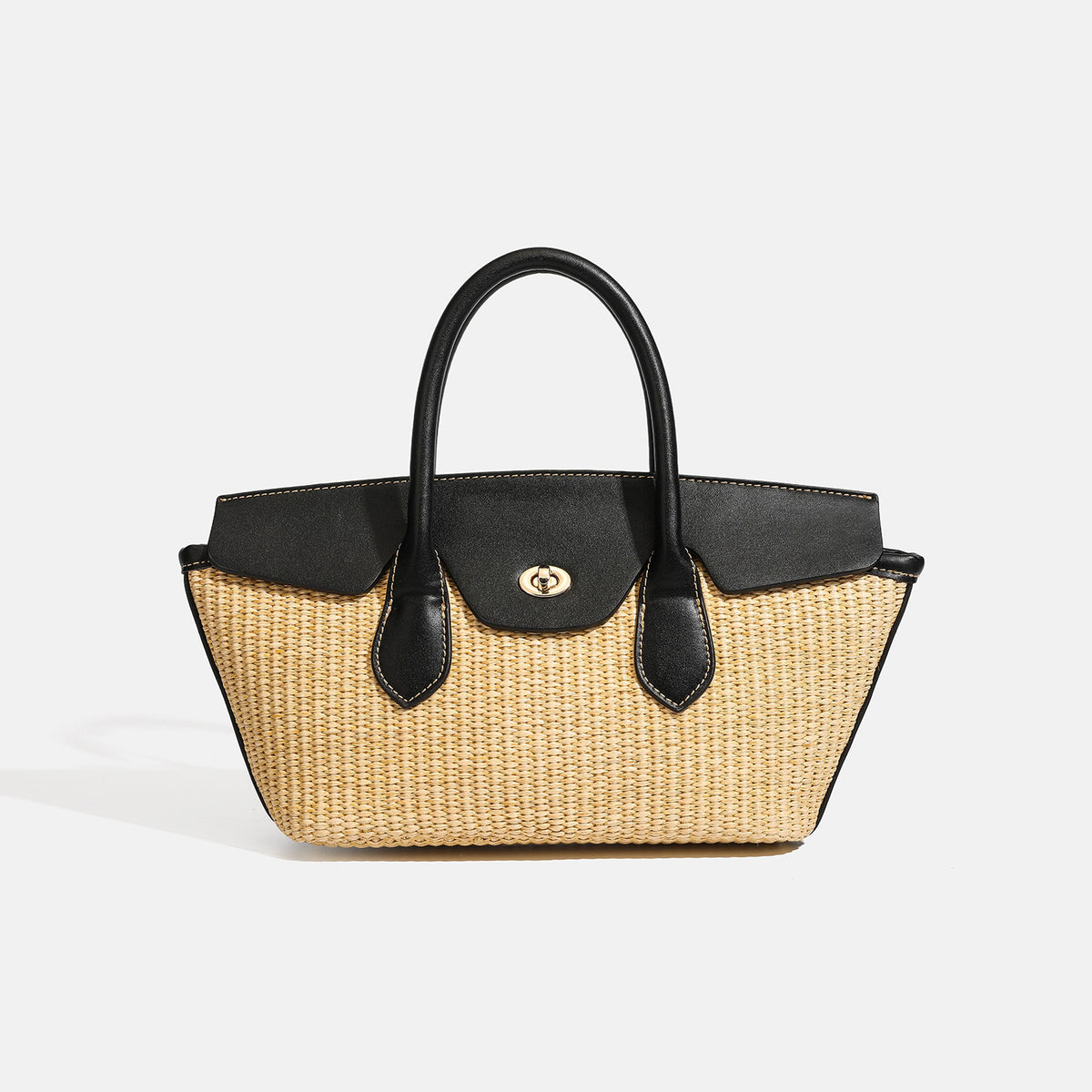 Structured tan woven straw tote bag with black leather-look trim, twin rounded top handles, gold-tone turn-lock front flap