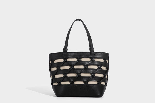 Structured woven lattice tote bag with cream lining, dual top handles, detachable crossbody strap, and silver-tone hardware